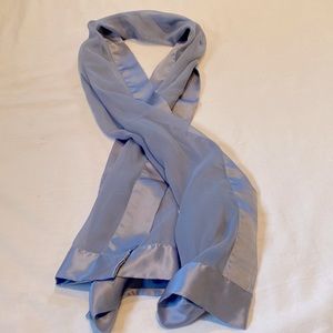Elegant sheer satin-trimmed stole.